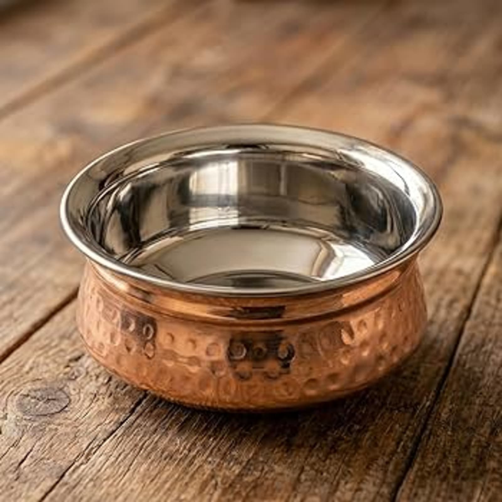 copper-bottomed hammered bowl