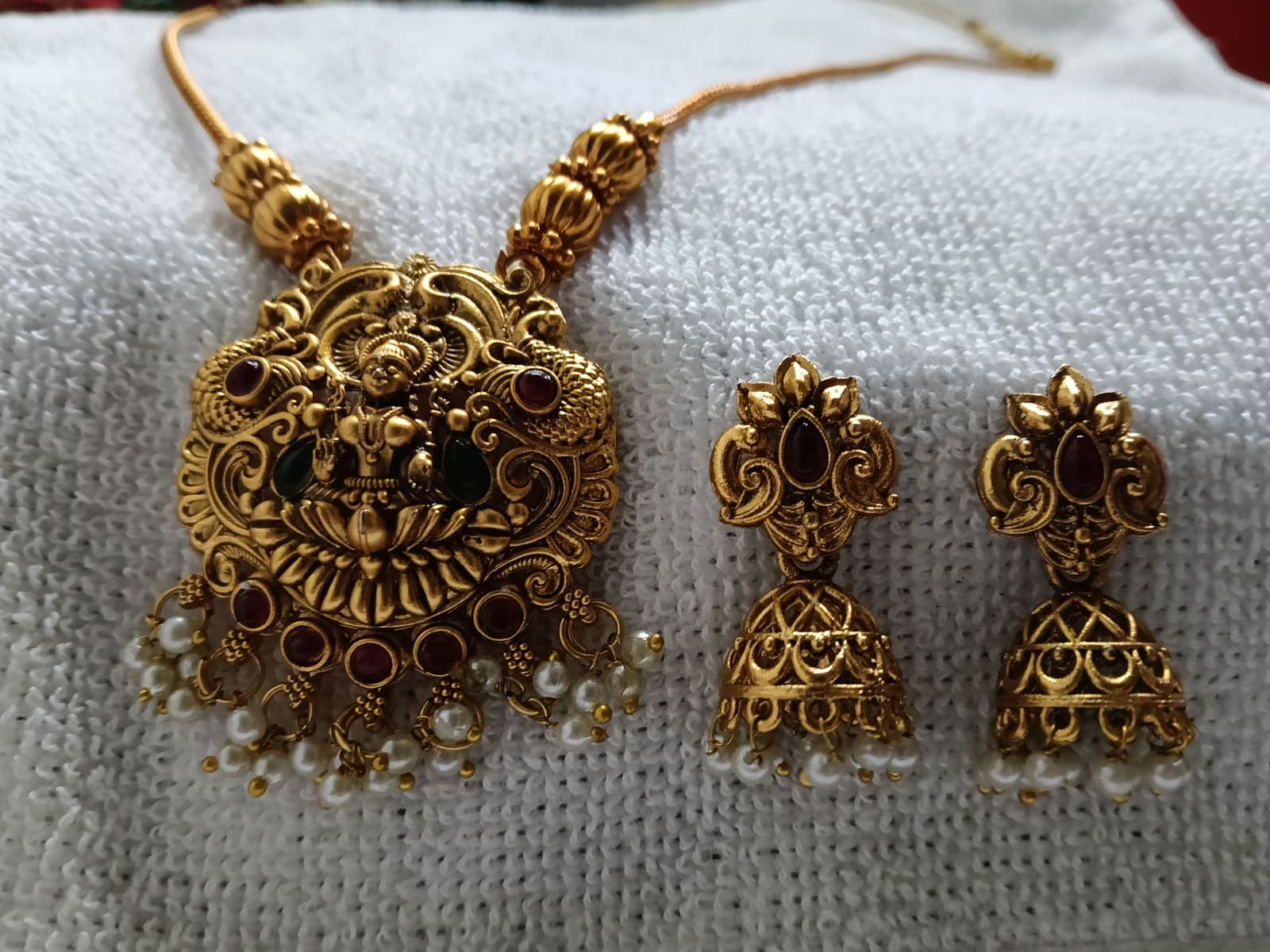 Lakshmi long haram red and green stones